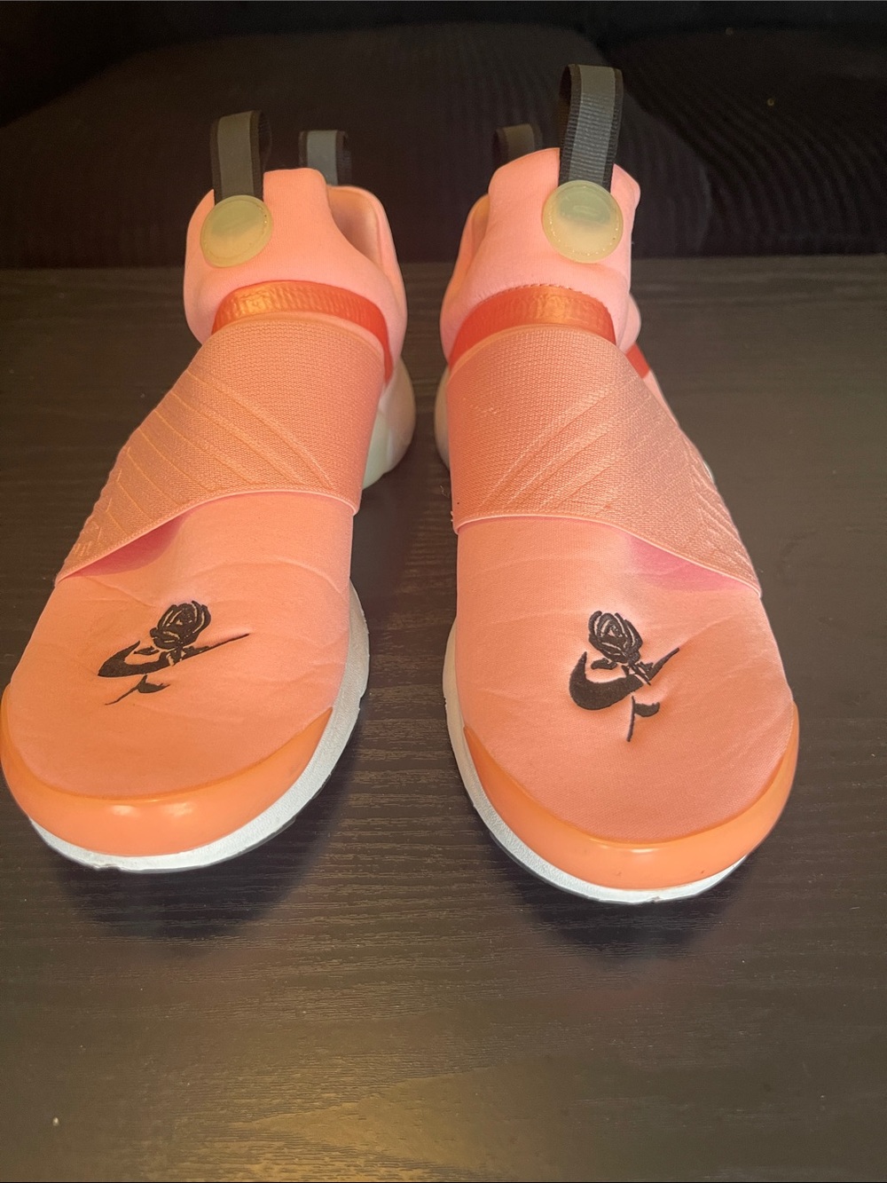 Nike Women’s Slip-On Sneakers in Coral Pink and Orange Accents
